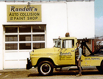 Randall “Randy” Feinberg with his tow truck in front of Randall’s Auto Collision and Paint Shop in Southampton in 1972.